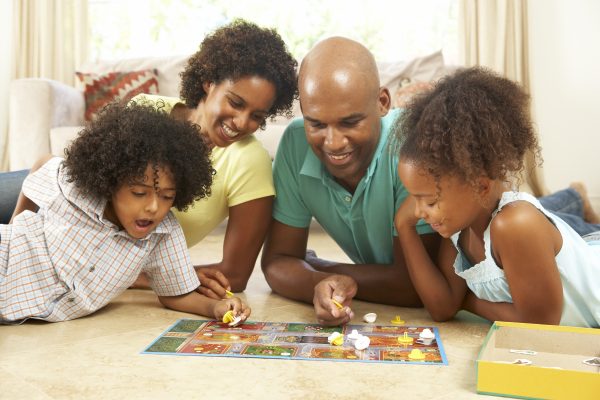 family playing a board game