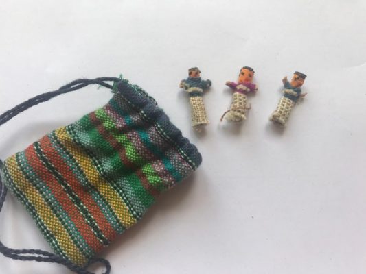 worry dolls and bag