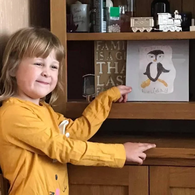 girl showing published book